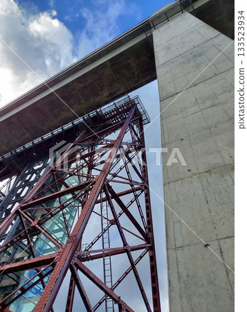 Looking up at the Amarube Bridge @ in front of the pier (portrait) 133523934
