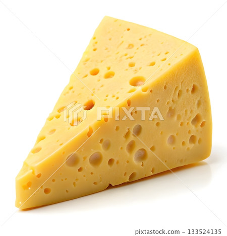 Wedge of Swiss cheese with visible holes against a white background Cheese slice 133524135