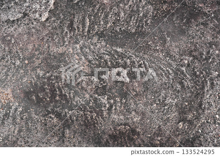 Weathered ancient natural rock wall with layered texture Weathered ancient natural rock wall with layered texture 133524295