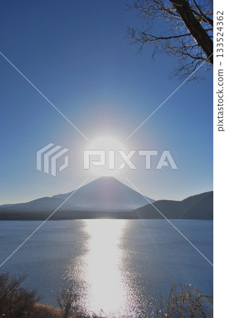 Mount Fuji and the sun from Lake Motosu 133524362