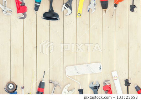DIY tools on wooden background 133525658