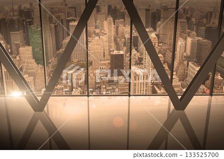 Room with large window looking on city 133525700
