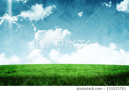 Blue sky over green field 133525781