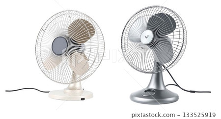 Two tabletop fans one white and one silver showcasing vintage and modern designs isolated on white background 133525919
