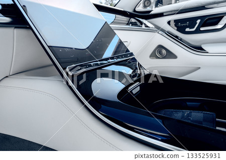 Luxury car interior with modern design and high-tech features in bright environment Luxury car interior with modern design and high-tech features in bright environment 133525931
