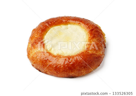 Delicious pastry filled with creamy cheese on a white background Delicious pastry filled with creamy cheese on a white background 133526305
