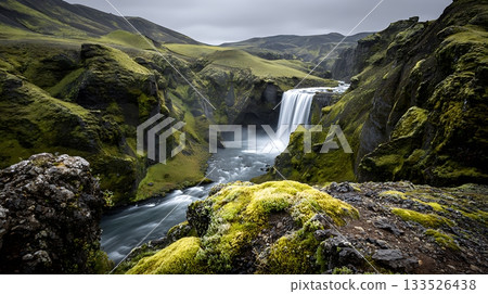 Scenic View of Waterfall from a Mossy Cliff in Iceland 133526438