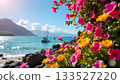 A picturesque coastal view with vibrant flowers and a clear sky 133527220