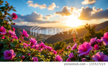 A serene landscape scene. It features a lush hillside blooming with vibrant flowers, against which a tranquil lake is nestled 133527223