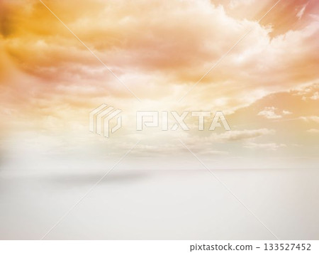 Minimalistic landscape flat design is showing expansive peach and golden clouds over white plain Minimalistic landscape flat design is showing expansive peach and golden clouds over white plain 133527452