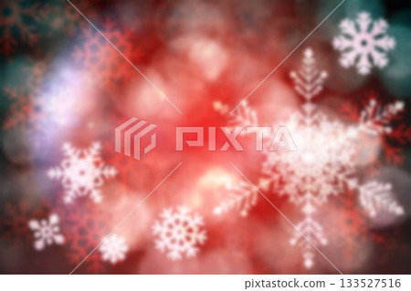 Flat design abstract winter graphic showing large ornate white snowflake with red green bokeh 133527516