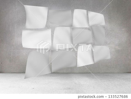 Floating sheets in front of grey wall Floating sheets in front of grey wall 133527686