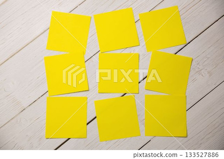 Directly above shot of yellow papers 133527886