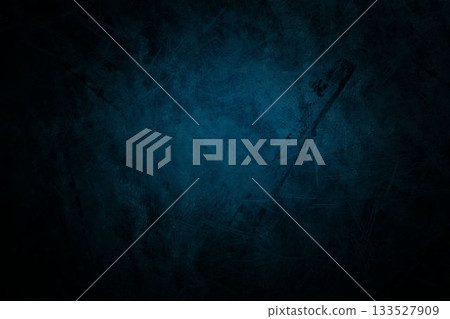 Displaying grunge surface fading from blue center into black edges with scratched, scuffed finish 133527909