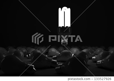 Illuminated energy efficient lightbulb over bulbs Illuminated energy efficient lightbulb over bulbs 133527926