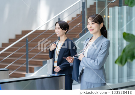 Businesswomen commuting to the office. Photo courtesy of Sky Perfect TV Tokyo Media Center. Businesswomen commuting to the office. Photo courtesy of Sky Perfect TV Tokyo Media Center. 133528418