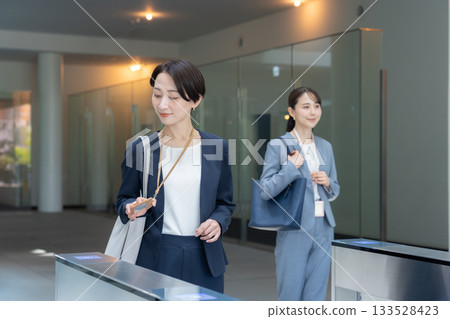 Businesswomen commuting to the office. Photo courtesy of Sky Perfect TV Tokyo Media Center. Businesswomen commuting to the office. Photo courtesy of Sky Perfect TV Tokyo Media Center. 133528423