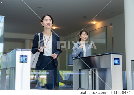 Businesswomen commuting to the office. Photo courtesy of Sky Perfect TV Tokyo Media Center. Businesswomen commuting to the office. Photo courtesy of Sky Perfect TV Tokyo Media Center. 133528425