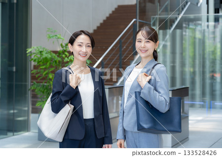 Businesswomen commuting to the office. Photo courtesy of Sky Perfect TV Tokyo Media Center. Businesswomen commuting to the office. Photo courtesy of Sky Perfect TV Tokyo Media Center. 133528426