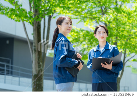 Female building maintenance engineer. Filming cooperation: Sky Perfect Tokyo Media Center. Female building maintenance engineer. Filming cooperation: Sky Perfect Tokyo Media Center. 133528469