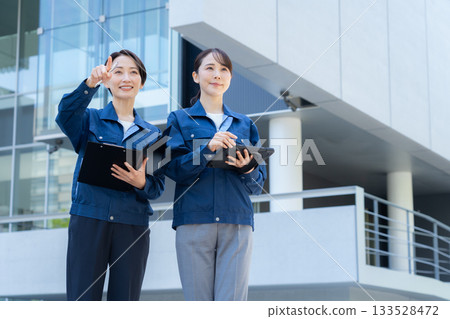 Female building maintenance engineer. Filming cooperation: Sky Perfect Tokyo Media Center. Female building maintenance engineer. Filming cooperation: Sky Perfect Tokyo Media Center. 133528472