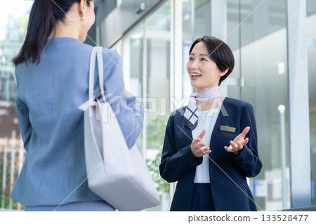 Concierge showing around the office. Filming cooperation: Sky Perfect Tokyo Media Center 133528477