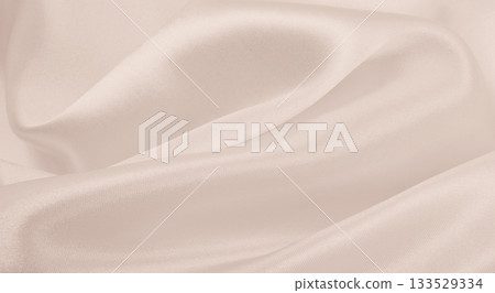 Smooth elegant golden silk or satin luxury cloth texture as wedding background. Luxurious background design. In Sepia toned. Retro style 133529334