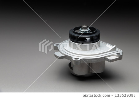 New spare part on a gradient gray background7 Internal combustion engine cooling system pump New spare part on a gradient gray background7 Internal combustion engine cooling system pump 133529395