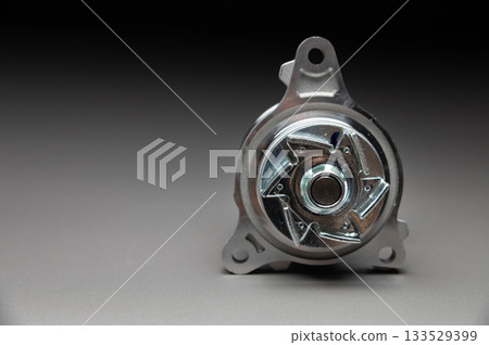 New spare part on a gradient gray background7 Internal combustion engine cooling system pump New spare part on a gradient gray background7 Internal combustion engine cooling system pump 133529399