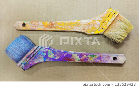 Close-up of art tools lined up with well-used paintbrushes 22 Close-up of art tools lined up with well-used paintbrushes 22 133529428