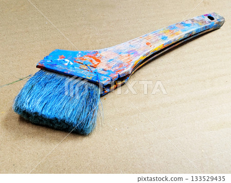 Close-up of art tools lined up with well-used paintbrushes 29 Close-up of art tools lined up with well-used paintbrushes 29 133529435