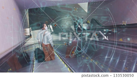 Descending Asian woman wearing blouse, mask at terminal escalator with suitcase, medical graphics 133530050