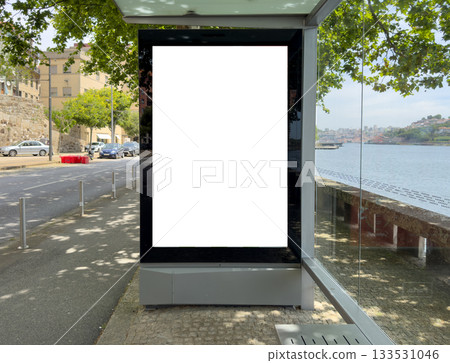 Advertisement screen stands on urban street. Large blank digital billboard with white display offers Advertisement screen stands on urban street. Large blank digital billboard with white display offers 133531046