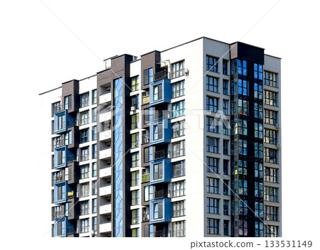 Modern residential highrise building with a bright facade and reflective blue windows. The structure 133531149