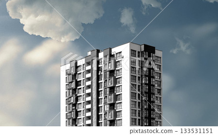 Modern residential high-rise building under a dramatic sky with clouds. The white and dark facade Modern residential high-rise building under a dramatic sky with clouds. The white and dark facade 133531151