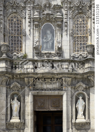 Igreja do Carmo church entrance in Porto Portugal with ornate statues and baroque details. Religious 133531198