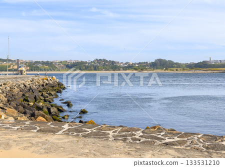 Foz do Douro river mouth in Porto Portugal with calm water and scenic horizon. Tranquil coastal 133531210