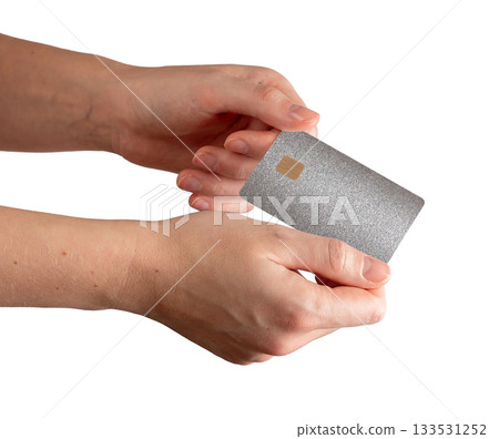 Silver card held in hand with sparkling glitter finish. Plastic chip design used for secure payment, Silver card held in hand with sparkling glitter finish. Plastic chip design used for secure payment, 133531252
