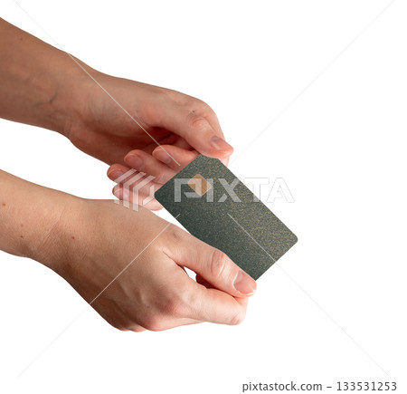 Green glitter card in hand with shimmering surface. Plastic chip design for credit, debit, secure Green glitter card in hand with shimmering surface. Plastic chip design for credit, debit, secure 133531253