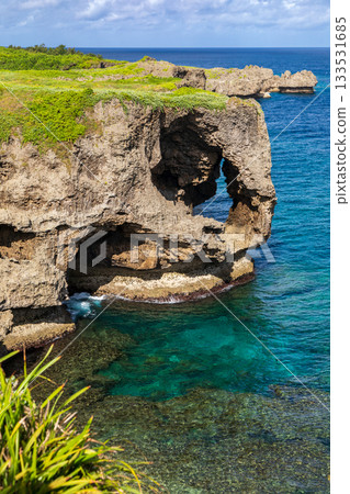 Okinomanzamo: Gradually stratified sea water and cliffs with azure blue color during sunny weather in summer Okinomanzamo: Gradually stratified sea water and cliffs with azure blue color during sunny weather in summer 133531685