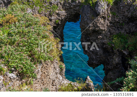 Okinomanzamo: Gradually stratified sea water and cliffs with azure blue color during sunny weather in summer Okinomanzamo: Gradually stratified sea water and cliffs with azure blue color during sunny weather in summer 133531691