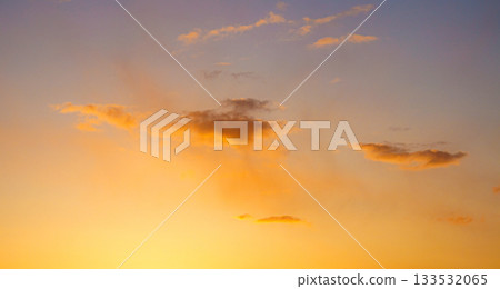 Orange glowing western sky and clouds just before sunset Orange glowing western sky and clouds just before sunset 133532065
