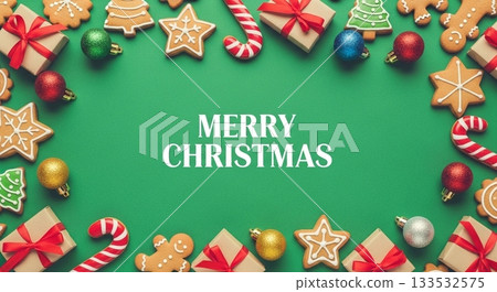Gingerbread cookies and candy cane frame on a green background 133532575