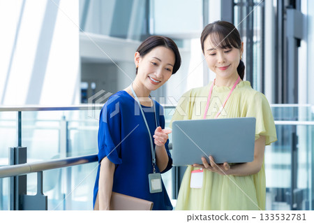 Businesswomen working in the office. Filming cooperation: Sky Perfect Tokyo Media Center 133532781