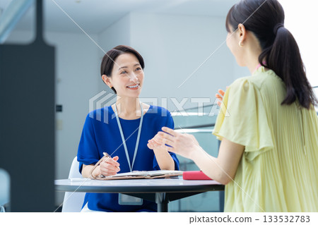 Businesswomen working in the office. Filming cooperation: Sky Perfect Tokyo Media Center 133532783