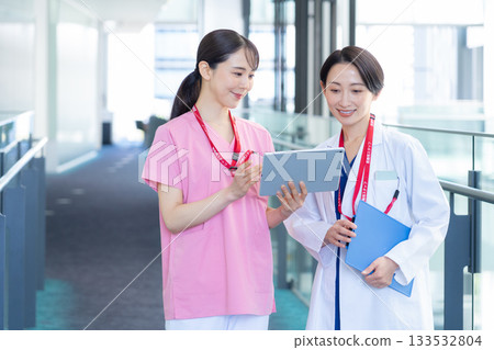 Female doctor working at the hospital. Filming cooperation: Sky Perfect Tokyo Media Center Female doctor working at the hospital. Filming cooperation: Sky Perfect Tokyo Media Center 133532804