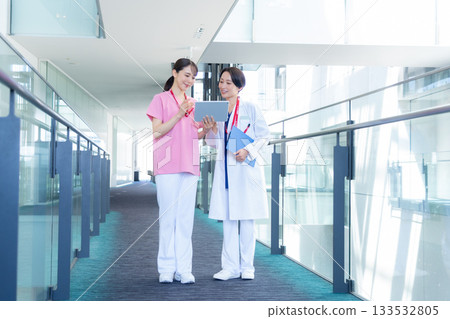 Female doctor working at the hospital. Filming cooperation: Sky Perfect Tokyo Media Center Female doctor working at the hospital. Filming cooperation: Sky Perfect Tokyo Media Center 133532805