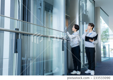 Female building maintenance engineer. Filming cooperation: Sky Perfect Tokyo Media Center. Female building maintenance engineer. Filming cooperation: Sky Perfect Tokyo Media Center. 133533090