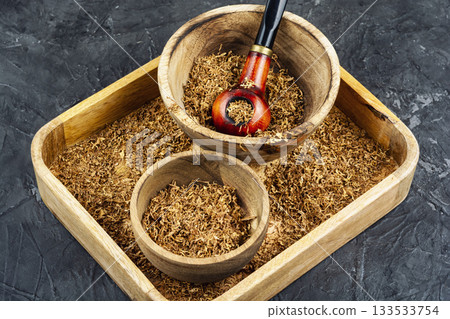 Old wooden tobacco pipe. Old wooden tobacco pipe. 133533754