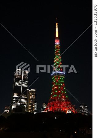 Tokyo Tower and buildings at night, decorated with Christmas tree colors. November, Minato Ward. 2202. Tokyo Tower and Shiba Park, decorated with Christmas tree colors. Tokyo Tower and buildings at night, decorated with Christmas tree colors. November, Minato Ward. 2202. Tokyo Tower and Shiba Park, decorated with Christmas tree colors. 133533970